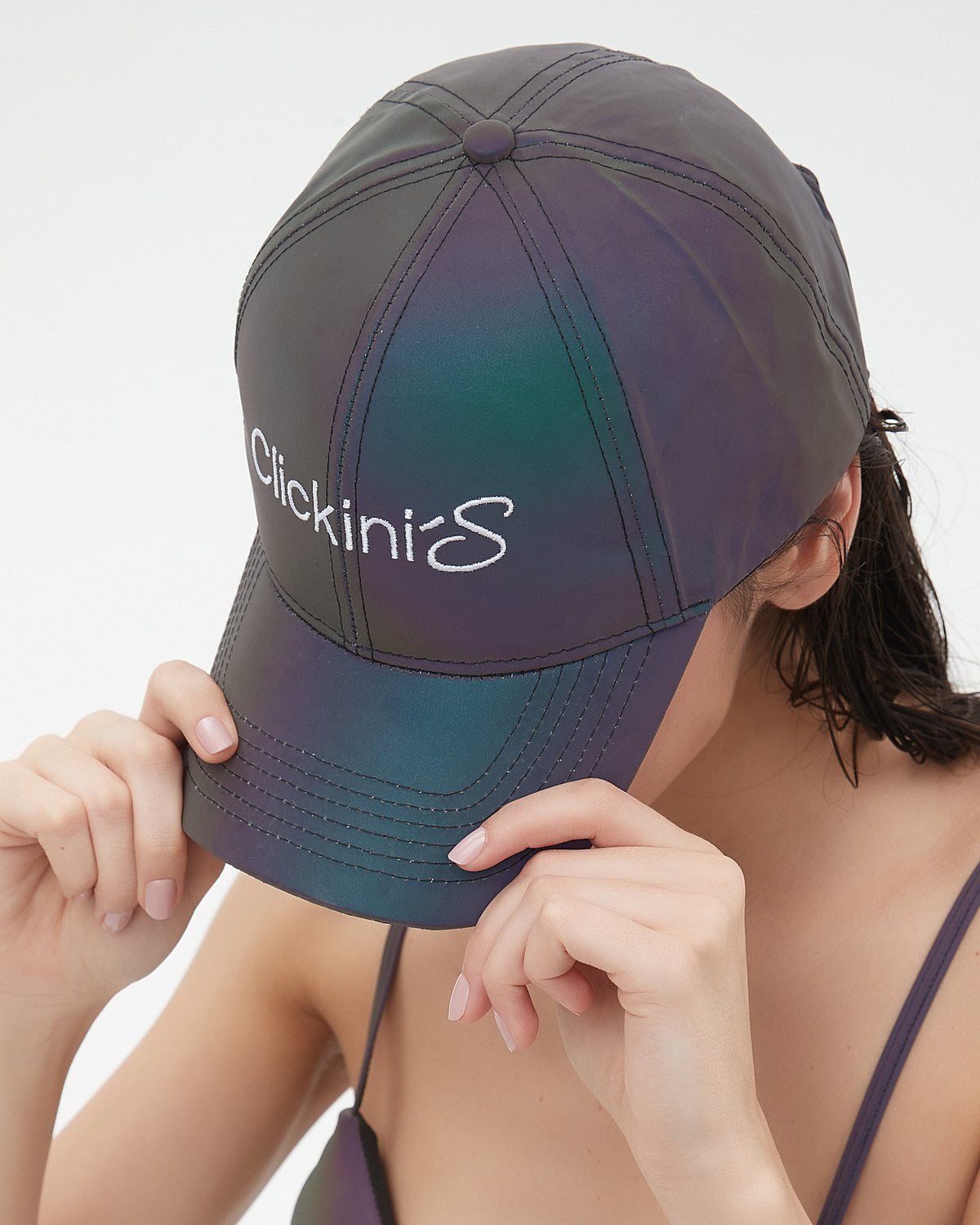 CLICK cap on a model: front, brim and logo