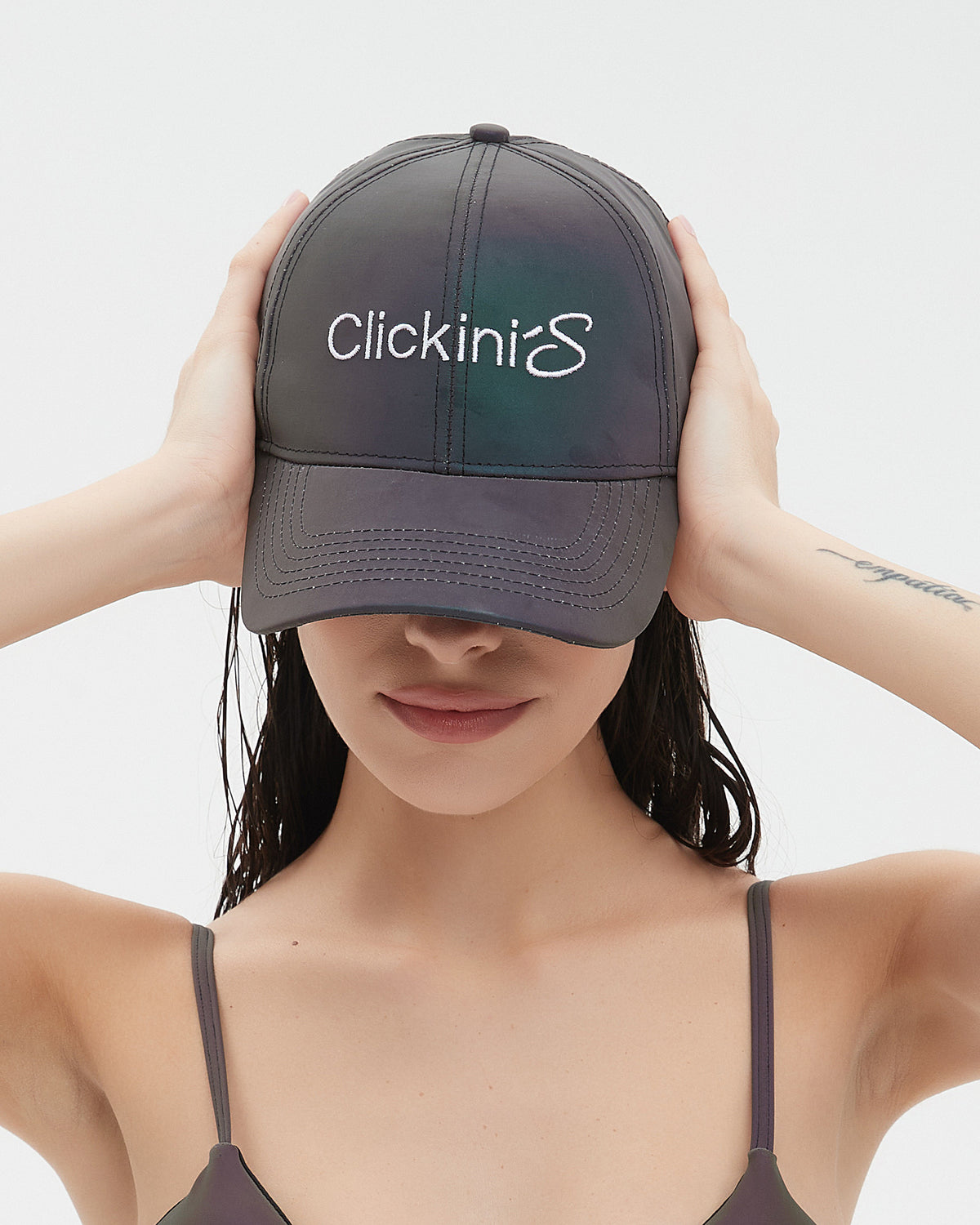 Front view of the CLICK cap worn on a model