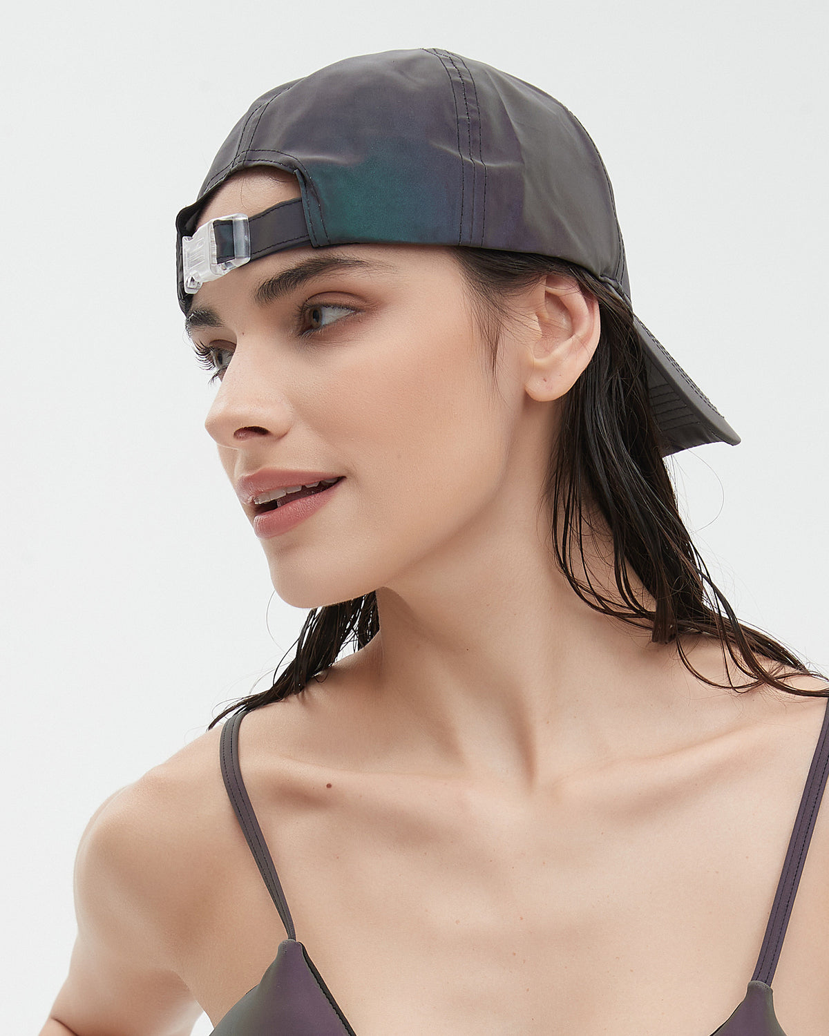 Rear of the CLICK cap worn backwards, with the closure above the forehead